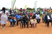 Officials from DWS Gert Sibande and Msukaligwa Municipalities sit with community members during the community engagement session